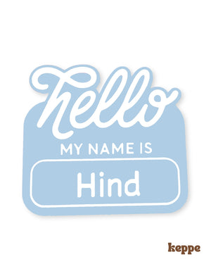 Name tag with 'Hello my name is Hind' text on a light blue background