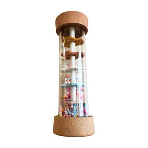 Decorative tower with wooden base and top, containing colorful beads inside on a white background
