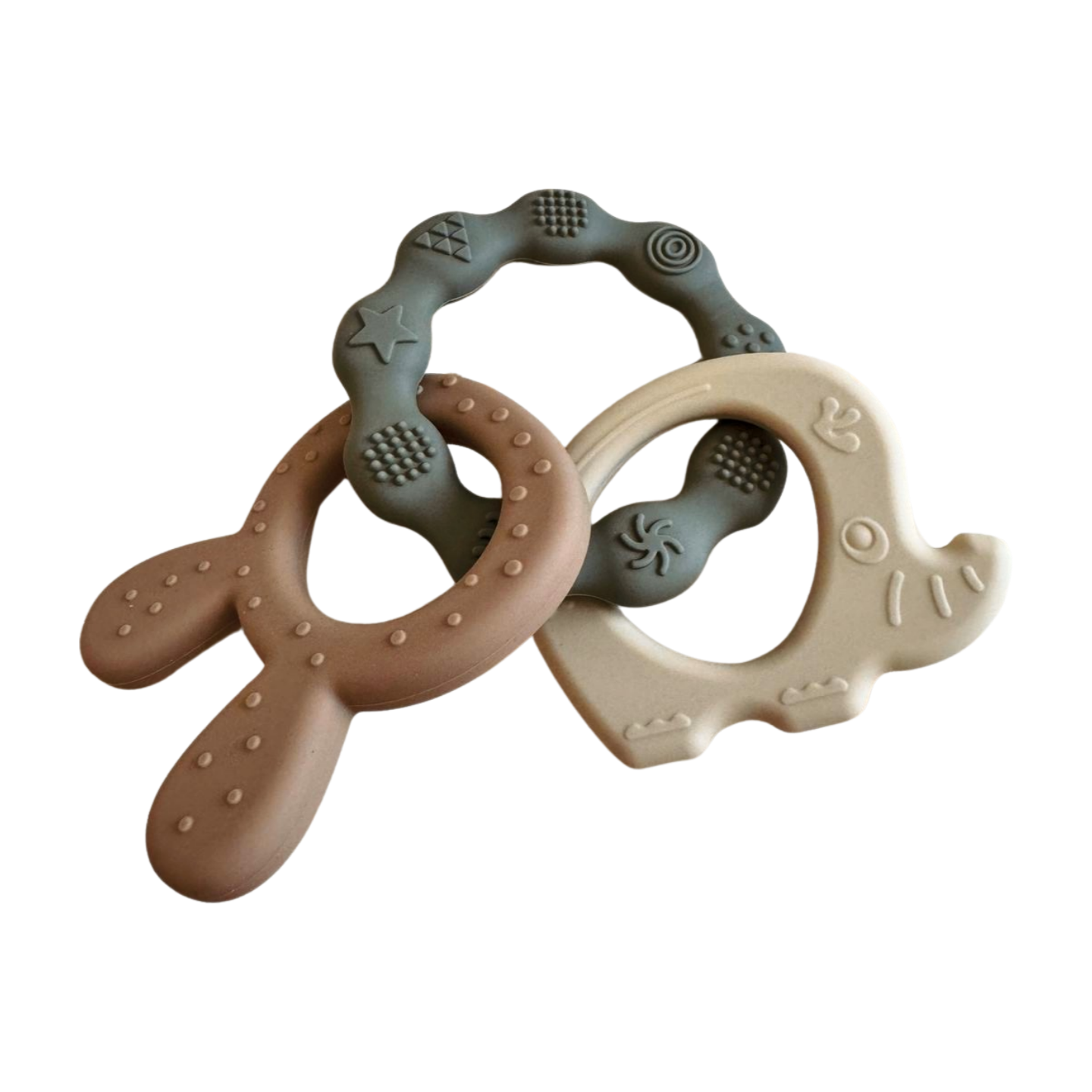 Three silicone teething rings in different colors on a white background